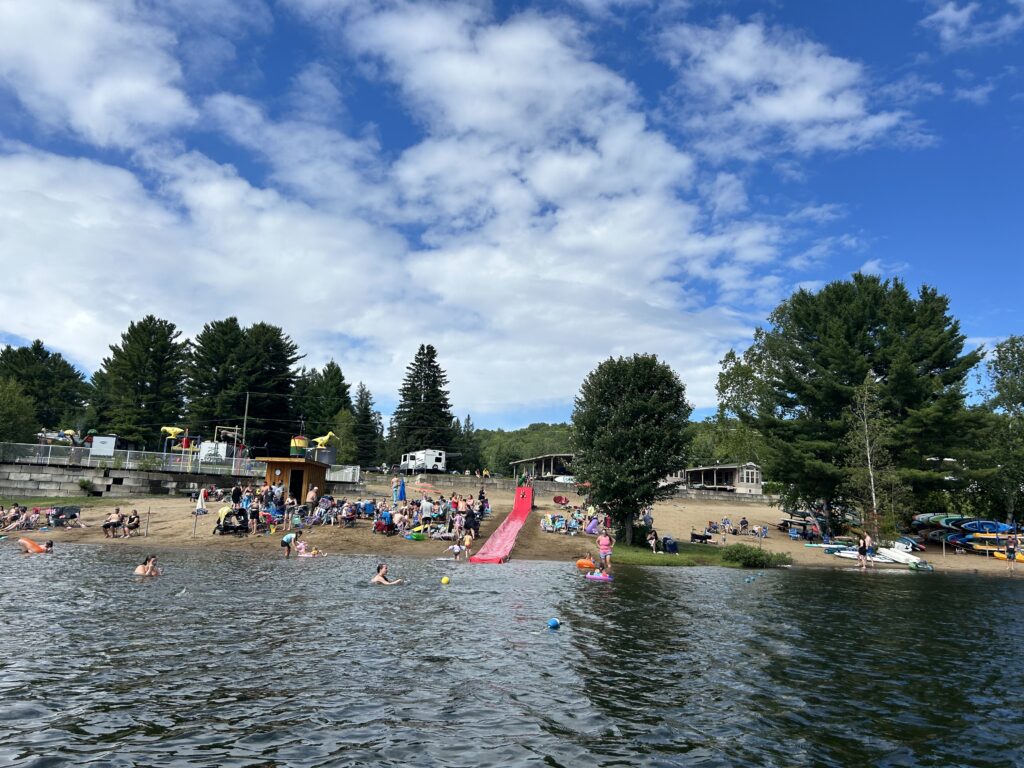 a group of people at a lake
